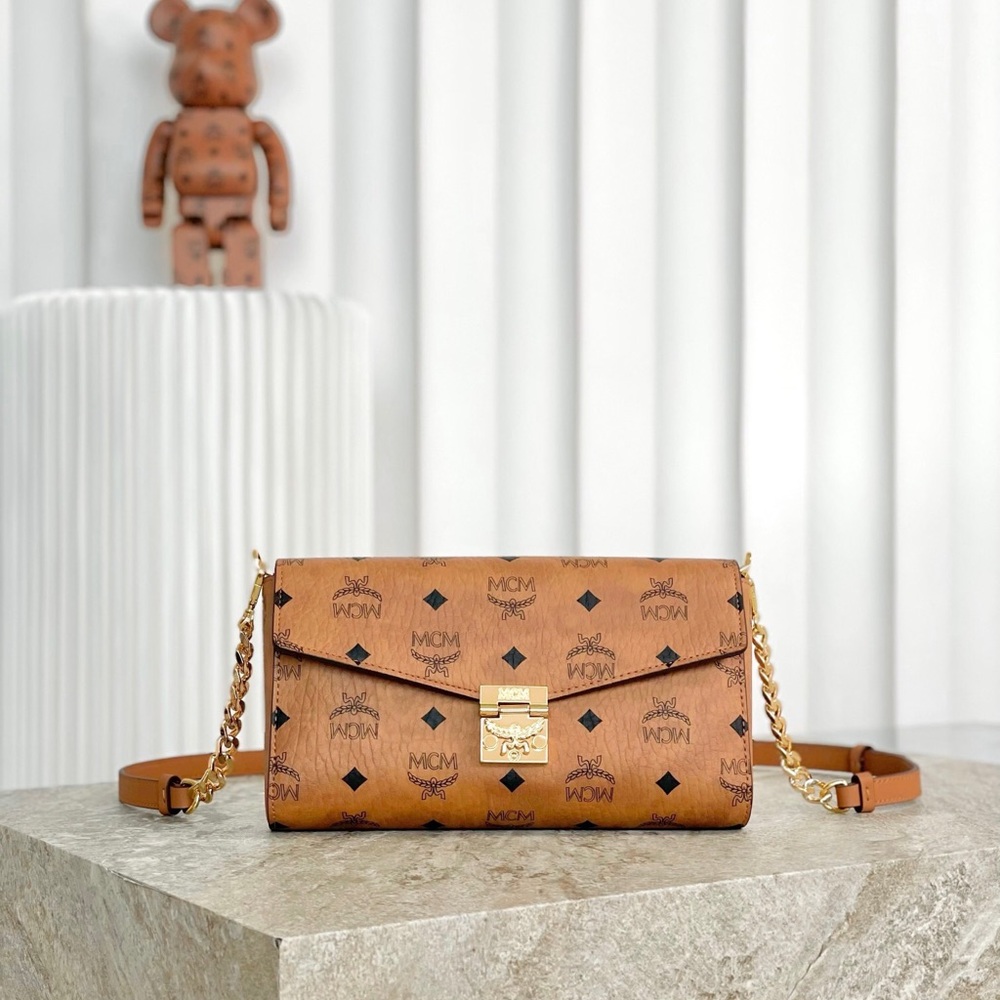 MCM Tan Monogram Clutch with Gold Accent - Picture 8 of 9